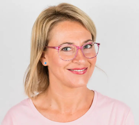 Model wearing Clara Hot Pink glasses – virtual try-on